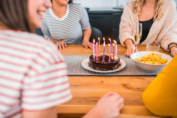 istock Friends celebrating birthday at home 1172679802