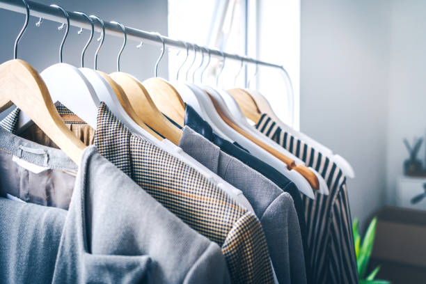 istock Clothing on hanger at the modern shop 1172681656