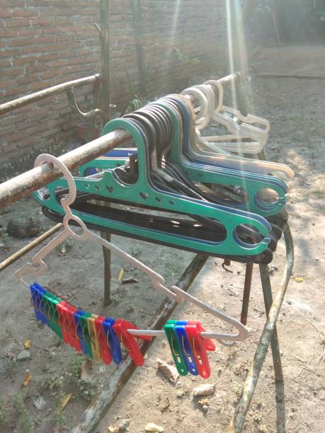 istock lined clothes hangers are lined up 1172683292