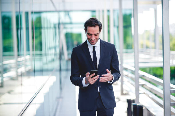 istock Business man using his cell phone 1172687335