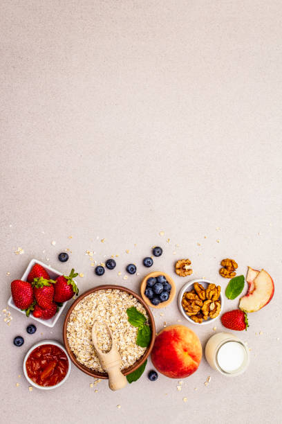 istock Healthy breakfast vegetarian (vegan) concept. Oatmeal with fresh berries and mint 1172687575
