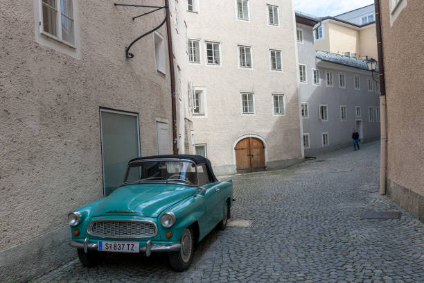 Retro Skoda Felicia turquoisev car at city street in Salzburg, Austria Salzburg, Austria - 21 June 2019: Old coupe Skoda Felicia car turquoise color at city street. Vintage classic cabriolet from 1959-1964 1959 photos stock pictures, royalty-free photos & images