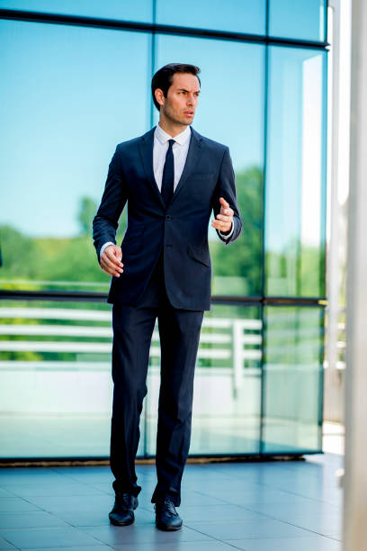 istock Young handsome businessman in elegant suit 1172689943