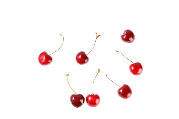 Fresh cherries on white background. Juicy summer berry close-up. stock photo