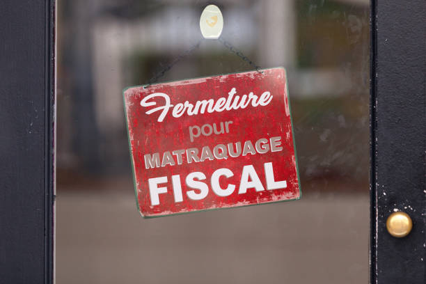 istock Tax bludgeoning closure - Closed sign 1172692502