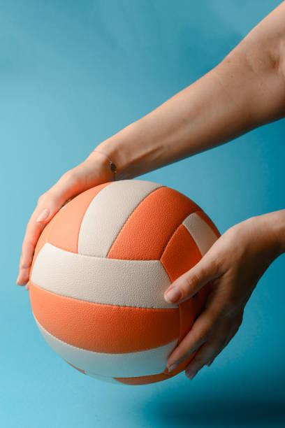 istock Volleyball in woman hands 1172693846