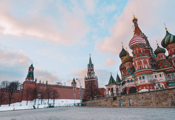 istock Kremlin in Moscow, St. Basil's Cathedral on red square at sunset in winter,  blue sky with clouds, 1172693876
