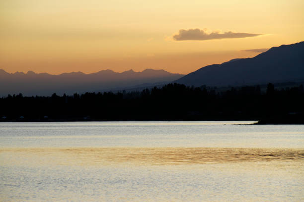 istock Beautiful sunset at lake Issyk Kul 1172697452