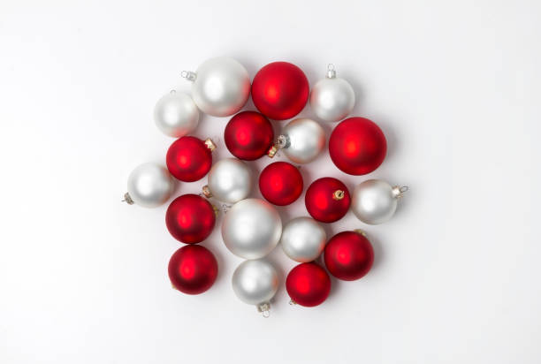 istock Red and white matte Christmas baubles decoration on white background with copy space 1172702121