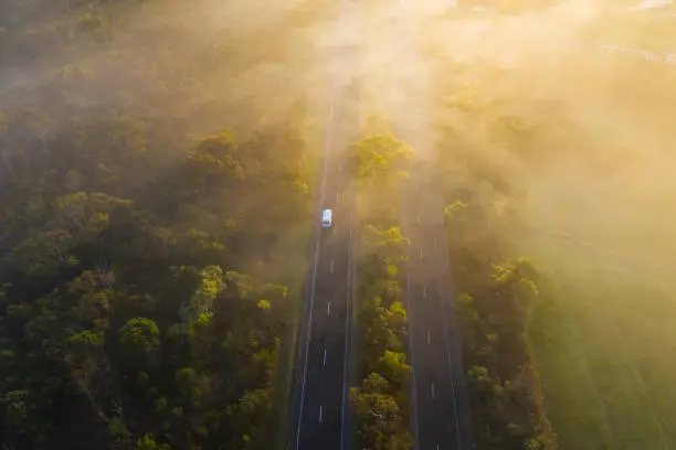 Photo of Aerial - Fog over Country Road in Victoria Australia on Sunrise