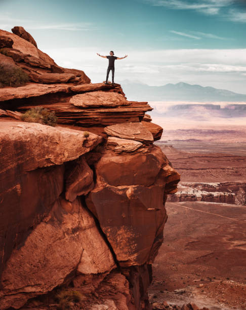 Photo of man on top of canyonlands