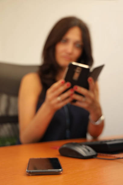 istock Portrait of a woman using a mobile phone 1172715155
