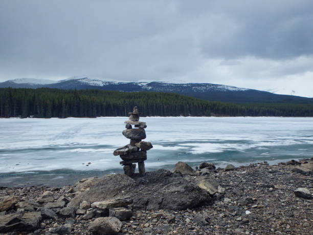 istock a frozen lake in the mountains 1172717778