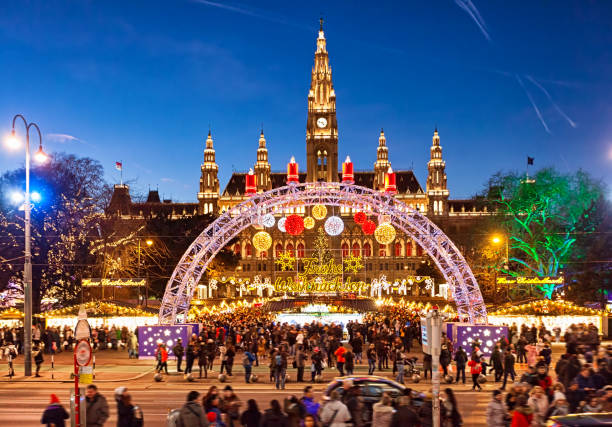 Christmas market on Rathausplatz in Vienna. Christmas market on Rathausplatz in Vienna. (with Merry Christmas script in German) vienna city hall stock pictures, royalty-free photos & images