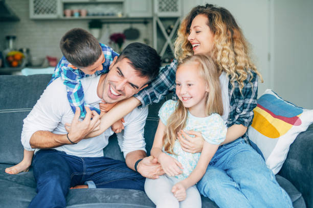 istock Family playing on the sofa 1172720611