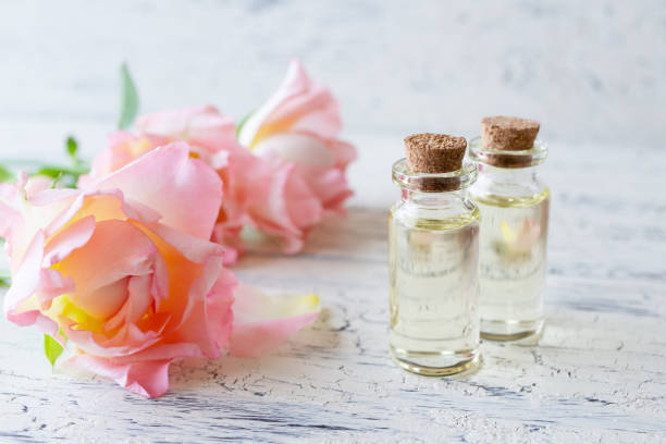istock Essential oil and pink rose 1172721279