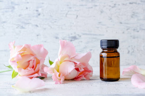 Essential oil and pink rose