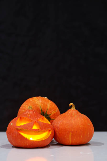 istock Halloween pumpkin jack in black holiday background 1172724983