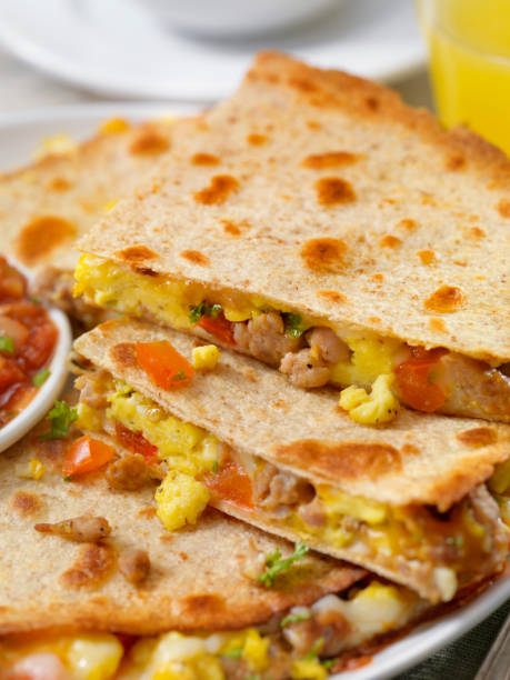 istock Cheesy Breakfast Quesadilla with Sausage, Scrambled Eggs and Peppers 1172733057