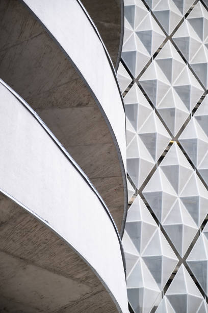 istock Modern office building with angular / rhombus structure of cells. Reworked abstract architecture photo. 1172733834