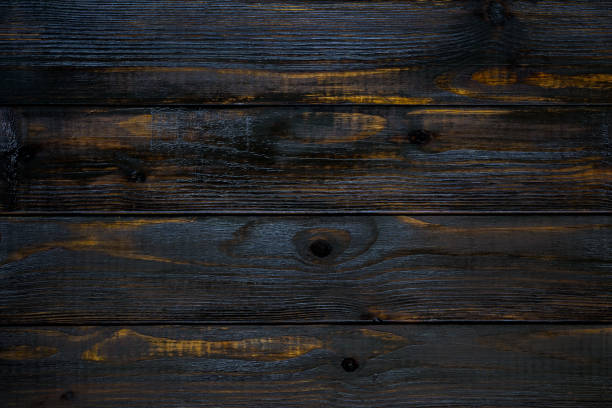 istock Background with dark wooden texture, horizontal arranged planks 1172735522