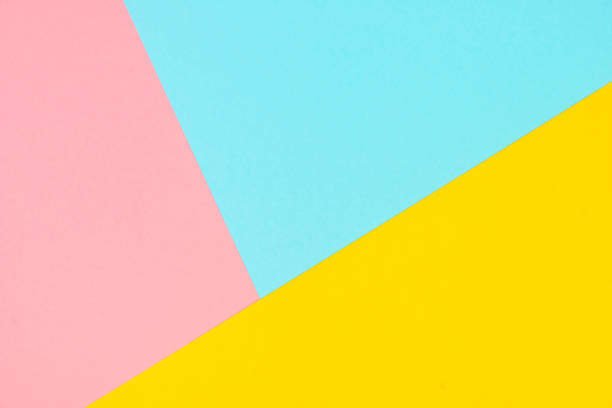 istock Pink, blue, yellow colored paper background 1172735555