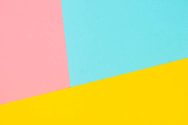 istock Pink, blue, yellow colored paper background 1172736132