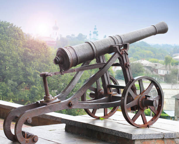 istock Black old cannon on the hill. Military cannon 1172738914