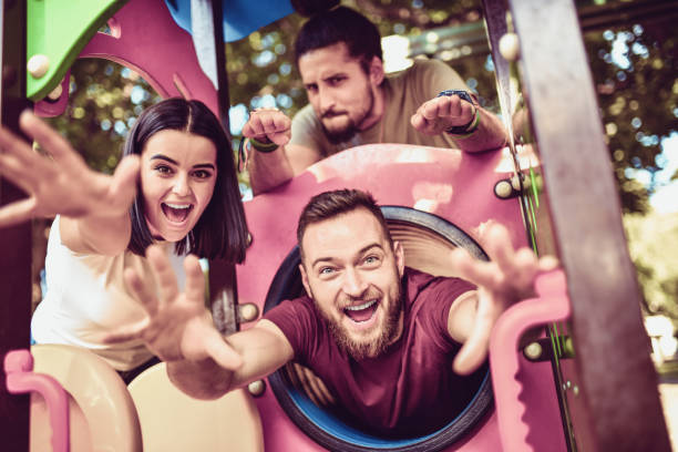 Happy Friends Having Fun In Child Playground