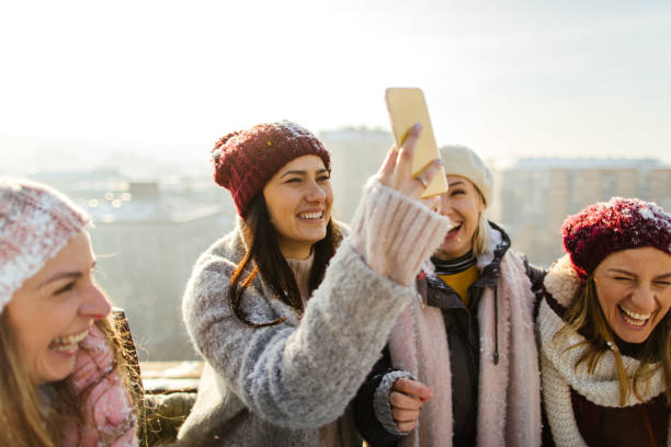istock Capturing this sunny winter afternoon with friends 1172740444