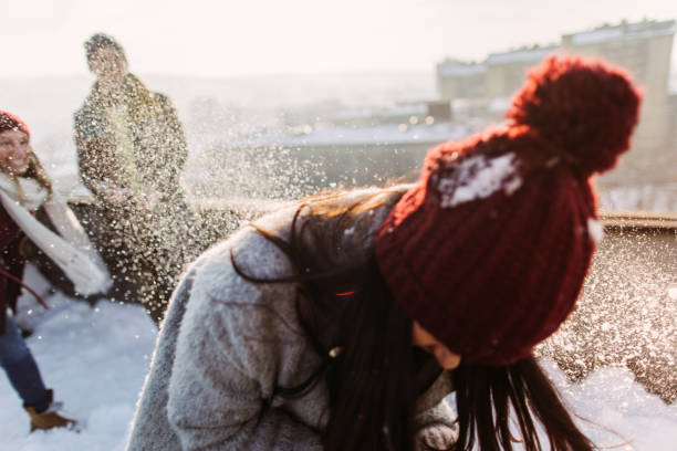 istock Snowball fight on the rooftop 1172740445
