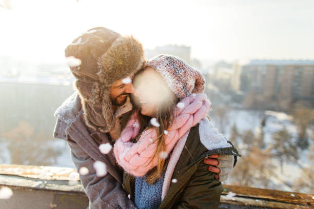 istock Loving couple enjoys snowy winter 1172741406