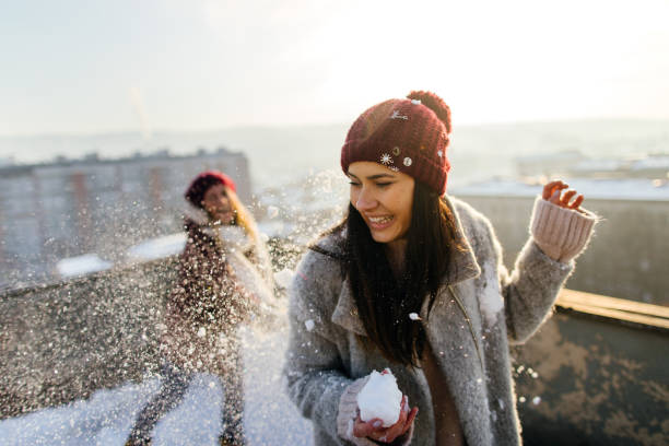 Snowball fight on the rooftop