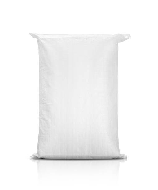 bolsa de arena o saco de lona de plástico blanco para arroz o producto agrícola - saco de arroz fotografías e imágenes de stock