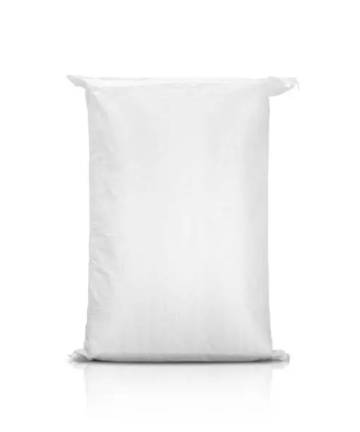 sand bag or white plastic canvas sack for rice or agriculture product isolated on white background