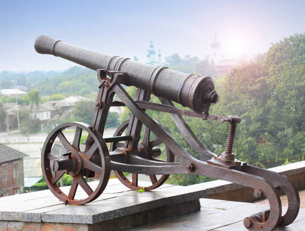 istock Black old cannon on the hill. Military cannon 1172742473