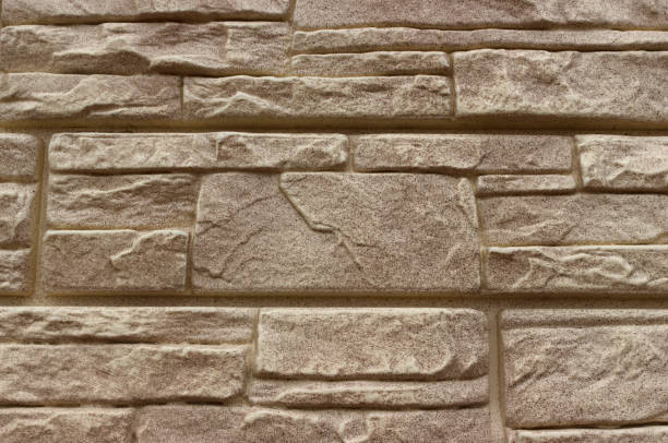 istock stone background in daylight. Interesting texture of stone 1172743390