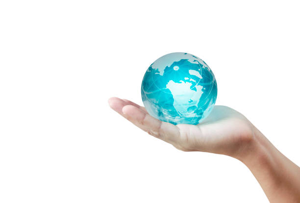 istock Globe ,earth in hand, holding our planet  glowing. Earth image provided by Nasa 1172754441