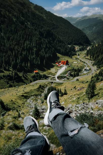 istock Low Section Of Man Over Landscape 1172755712