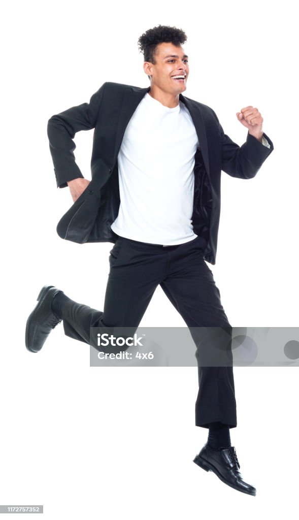 Full Length Front View Of 2029 Years Old Adult Handsome People Tall Person Curly Hair African Ethnicity Africanamerican Ethnicity Male Young Men Businessman Business Person Running Exercising Jumping In Front Of White Full Length Front View Of 2029 Years Old Adult Handsome People Tall Person Curly Hair African Ethnicity Africanamerican Ethnicity Male Young Men Businessman Business Person Running Exercising Jumping In Front Of White