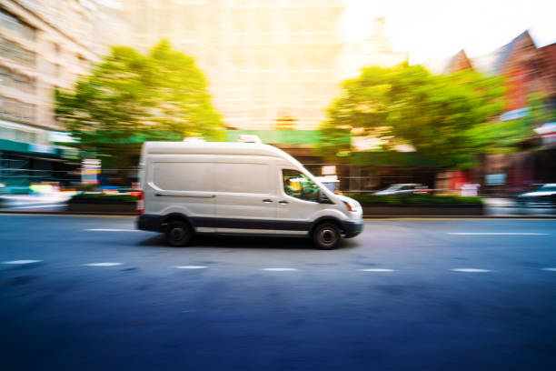 istock White delivery van in Manhattan New York 1172760233