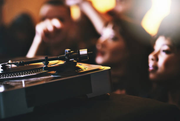 What's your favourite song? Cropped shot of unrecognizable people standing next to a turntable in a nightclub dubstep photos stock pictures, royalty-free photos & images