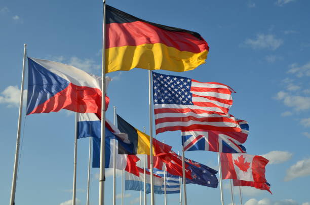 istock Different nations flags together in the sky 1172767465