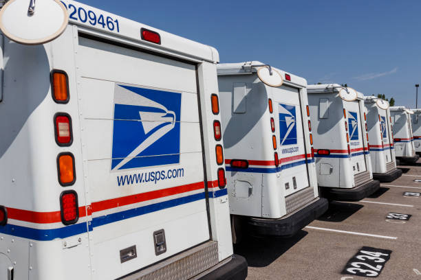 USPS Post Office Mail Trucks. The Post Office is responsible for providing mail delivery VIII Indianapolis - Circa August 2019: USPS Post Office Mail Trucks. The Post Office is responsible for providing mail delivery VIII first class photos stock pictures, royalty-free photos & images