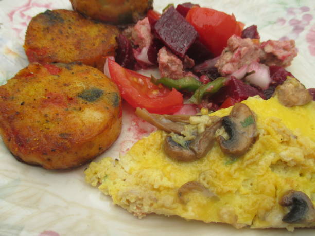 istock Vegetable patties served with omelette and raw vegetables 1172769379