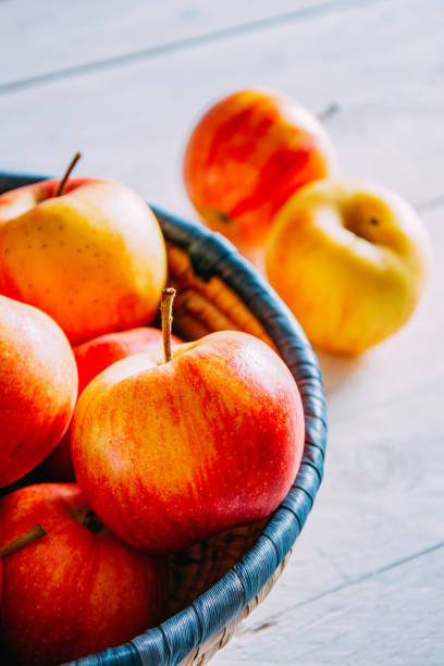 istock Delicious Apples on a Rustic Wooden Background 1172770177