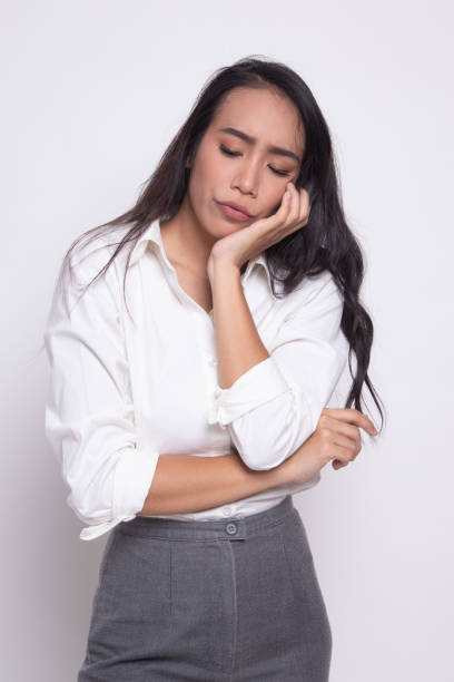 istock Beautiful young Asian woman get bored. 1172778564