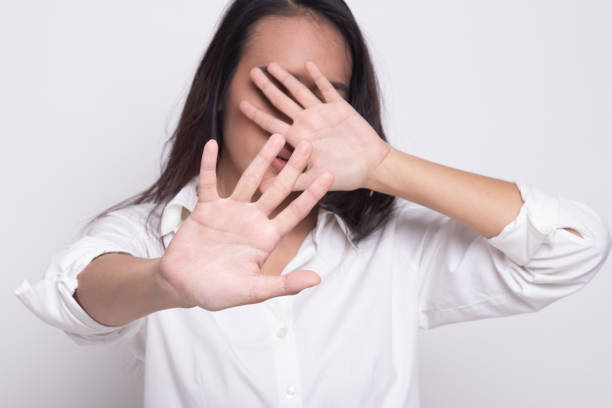 istock Young Asian woman hide her  face. 1172782720