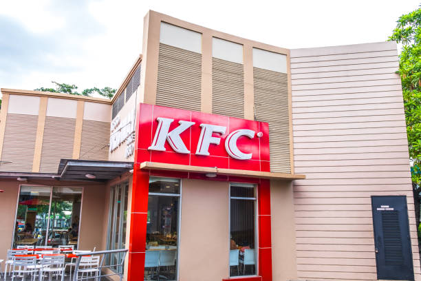 View of KFC or  Kentucky Fried Chicken front store,  an American fast-food restaurant chain that specializes in fried chicken, in Bandung, Indonesia. stock photo