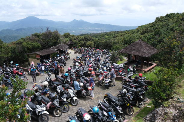 View of motorcycle parking at Tangkuban Perahu, a stratovolcano 30 km north of the city of Bandung, the provincial capital of West Java, Indonesia. stock photo